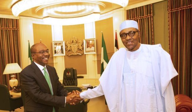 CBN EMEFIELE SHAKES BUHARI