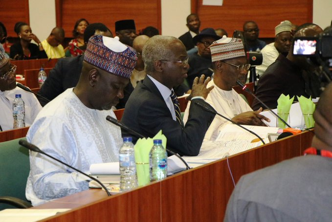 Fashola middle defending the budget of the Ministry of Works at the House of Representatives