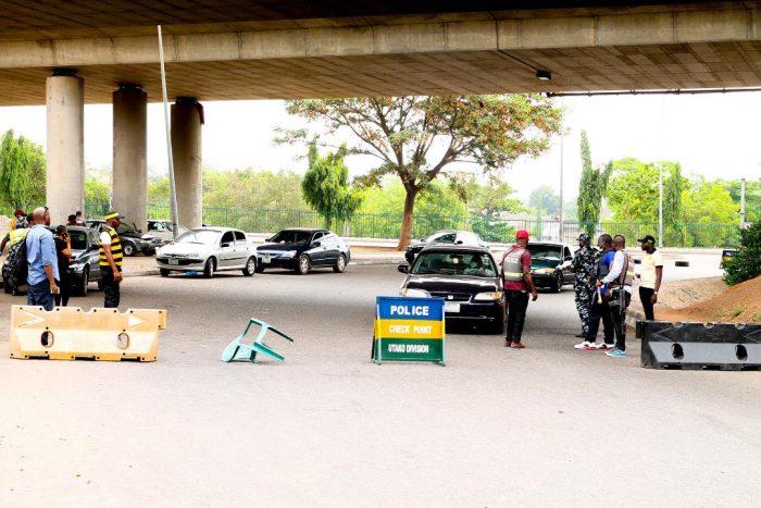 Securitymen under the Berger Bridge in Abuja e1585668362587
