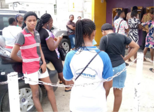 Customers clustered at a banks ATM point in Port Harcourt 503x367 1