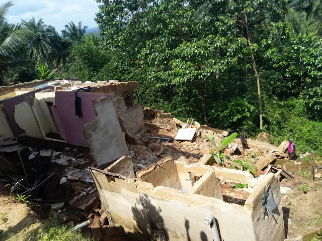 One of the collapsed buildings