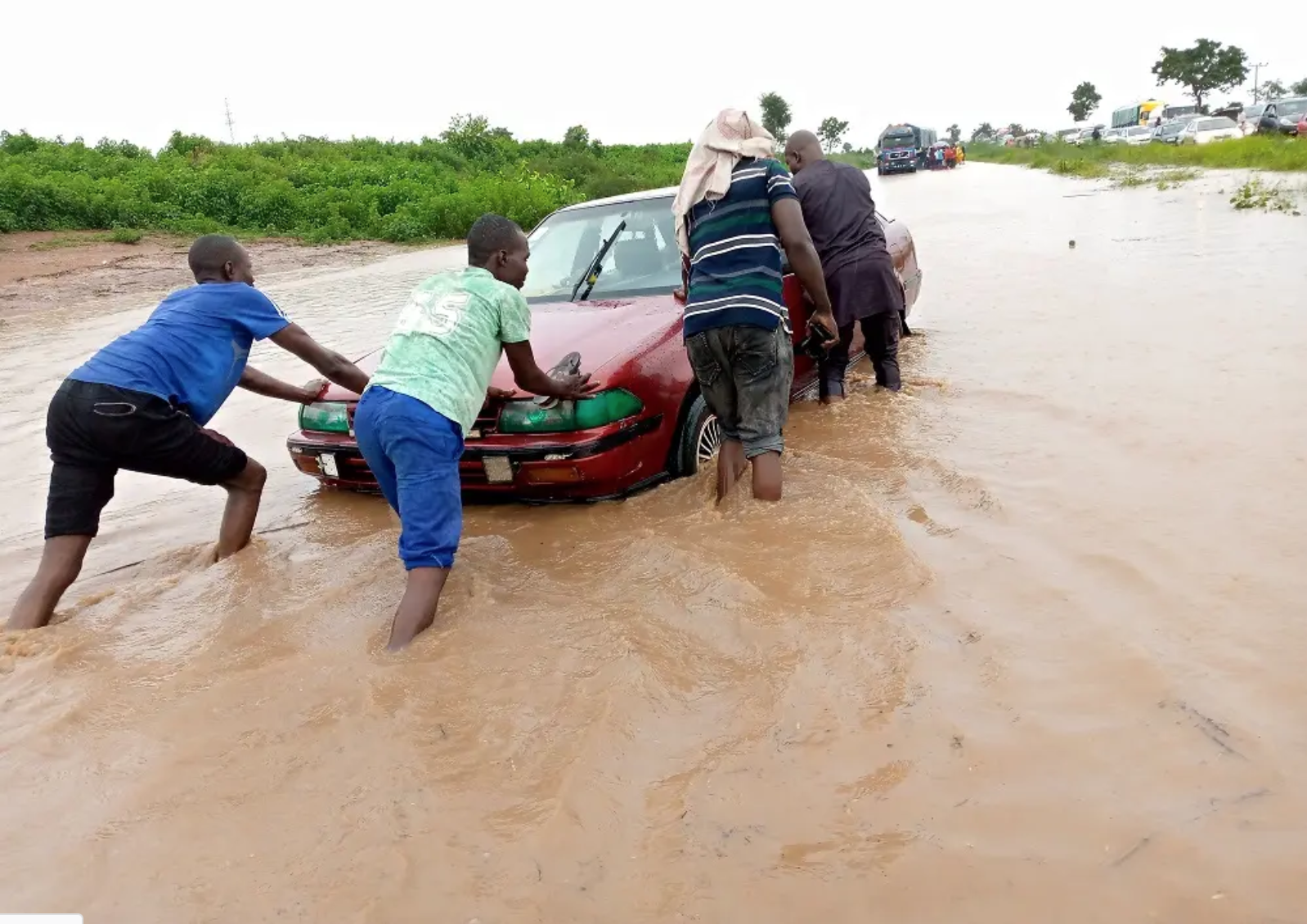 Photos: Floodwaters take over Abuja-Lokoja expressway
