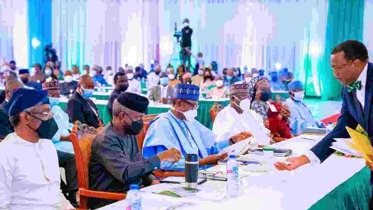 Economists seek caution on devaluation of naira