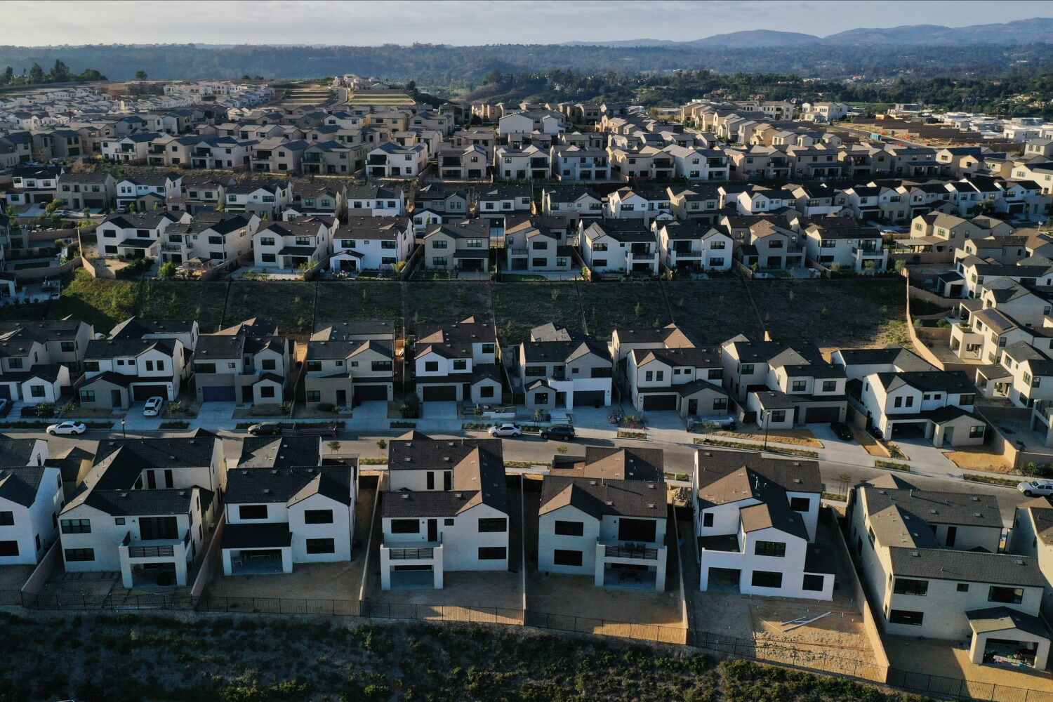 As Housing sales fall, China lowers its key interest rate.