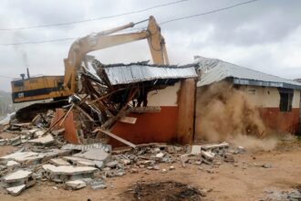 Lagos gov't demolishes illegal shops under powerline, road setbacks